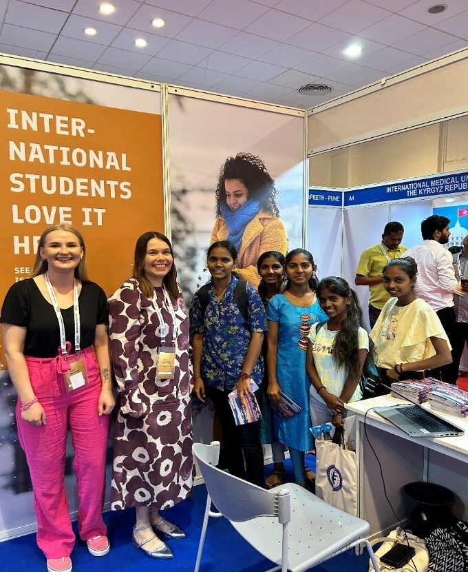 Sanni Saari and Sirpa Rutanen meeting a group of local high school girls in the second fair in Mumbai.